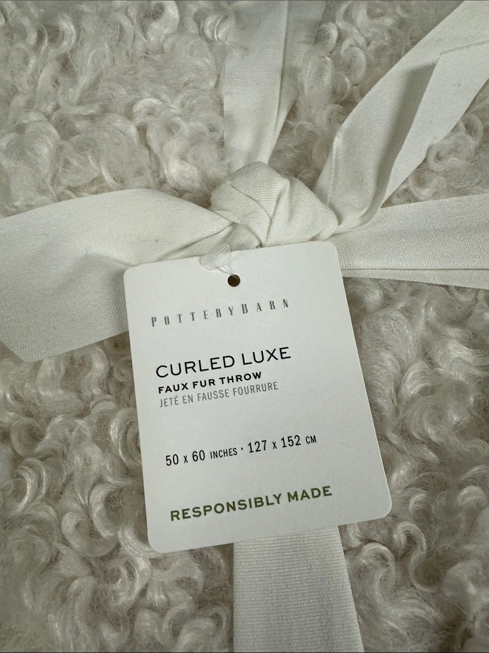 NWT Pottery Barn Curled Luxe faux fur throw.  Ivory 50x60.